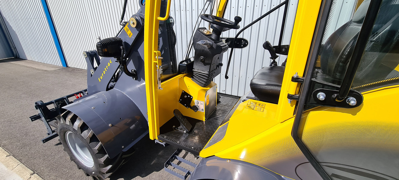 Eurotrac W12 Radlader Hoflader - Zglobni utovarivač: slika Eurotrac W12 Radlader Hoflader - Zglobni utovarivač Eurotrac W12 Radlader Hoflader - Zglobni utovarivač: slika Eurotrac W12 Radlader Hoflader - Zglobni utovarivač