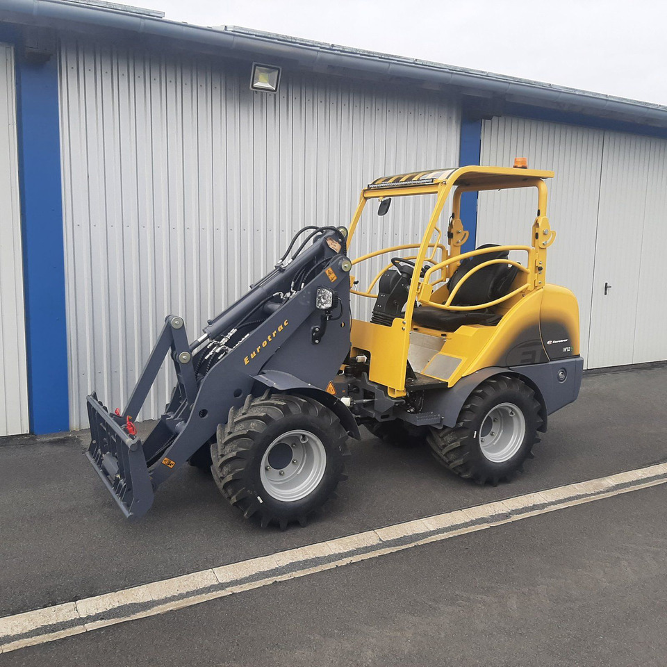 Eurotrac W12 Radlader Hoflader - Zglobni utovarivač: slika Eurotrac W12 Radlader Hoflader - Zglobni utovarivač Eurotrac W12 Radlader Hoflader - Zglobni utovarivač: slika Eurotrac W12 Radlader Hoflader - Zglobni utovarivač