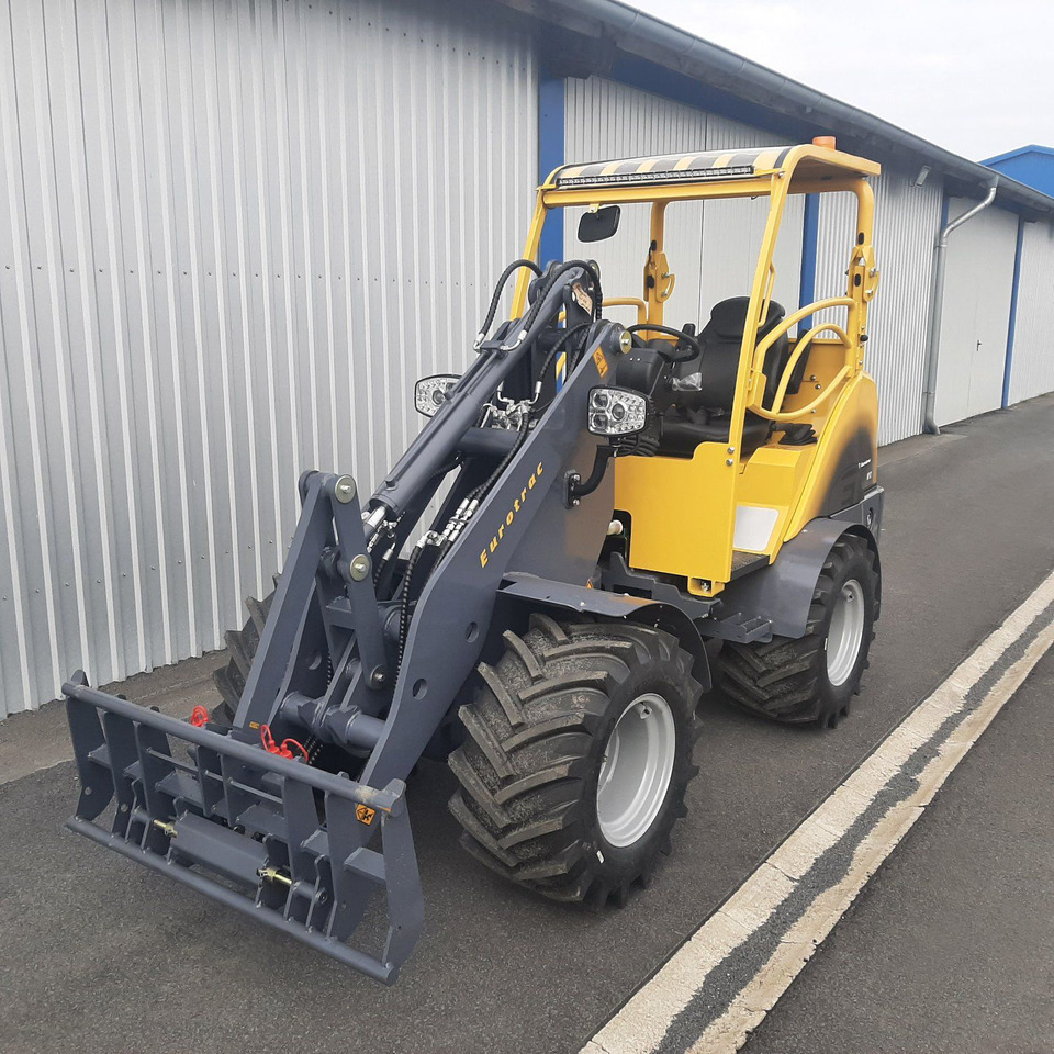 Eurotrac W12 Radlader Hoflader - Zglobni utovarivač: slika Eurotrac W12 Radlader Hoflader - Zglobni utovarivač Eurotrac W12 Radlader Hoflader - Zglobni utovarivač: slika Eurotrac W12 Radlader Hoflader - Zglobni utovarivač