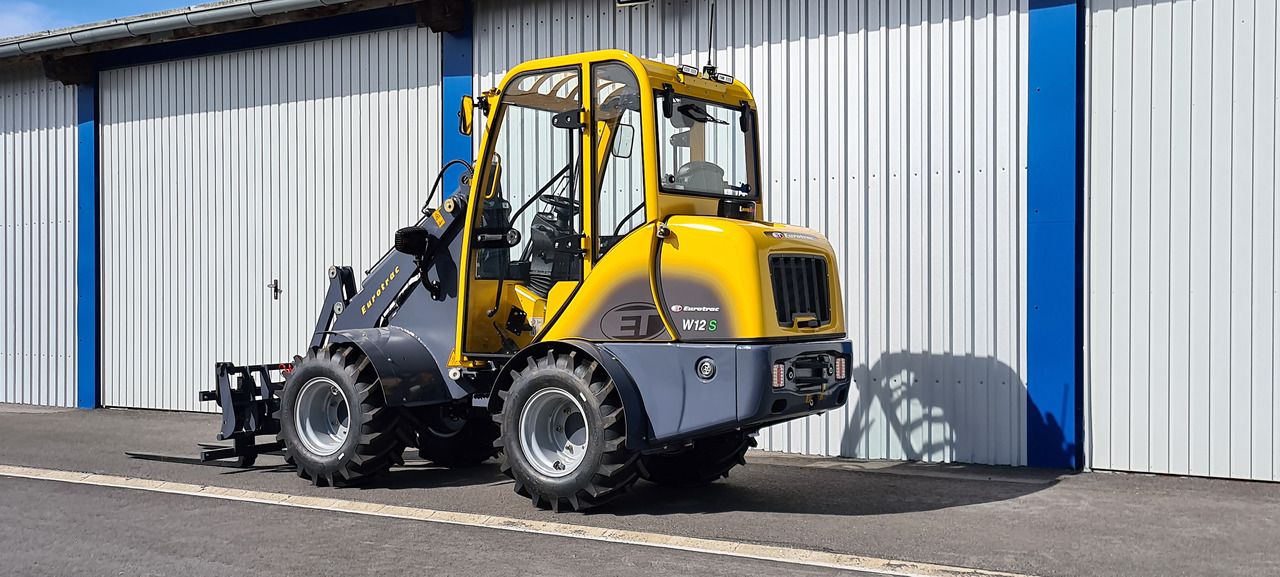 Eurotrac W12 Radlader Hoflader - Zglobni utovarivač: slika Eurotrac W12 Radlader Hoflader - Zglobni utovarivač Eurotrac W12 Radlader Hoflader - Zglobni utovarivač: slika Eurotrac W12 Radlader Hoflader - Zglobni utovarivač