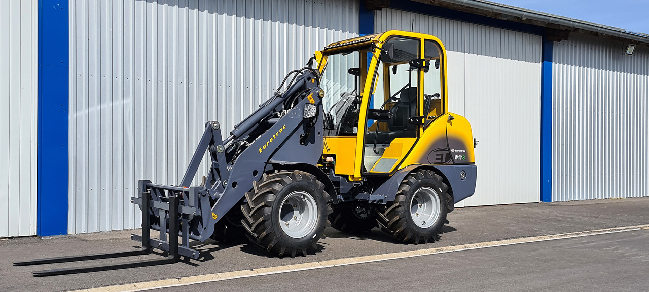 Eurotrac W12 Radlader Hoflader - Zglobni utovarivač: slika Eurotrac W12 Radlader Hoflader - Zglobni utovarivač Eurotrac W12 Radlader Hoflader - Zglobni utovarivač: slika Eurotrac W12 Radlader Hoflader - Zglobni utovarivač