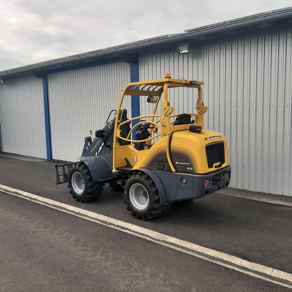 Eurotrac W12 Radlader Hoflader - Zglobni utovarivač: slika Eurotrac W12 Radlader Hoflader - Zglobni utovarivač Eurotrac W12 Radlader Hoflader - Zglobni utovarivač: slika Eurotrac W12 Radlader Hoflader - Zglobni utovarivač
