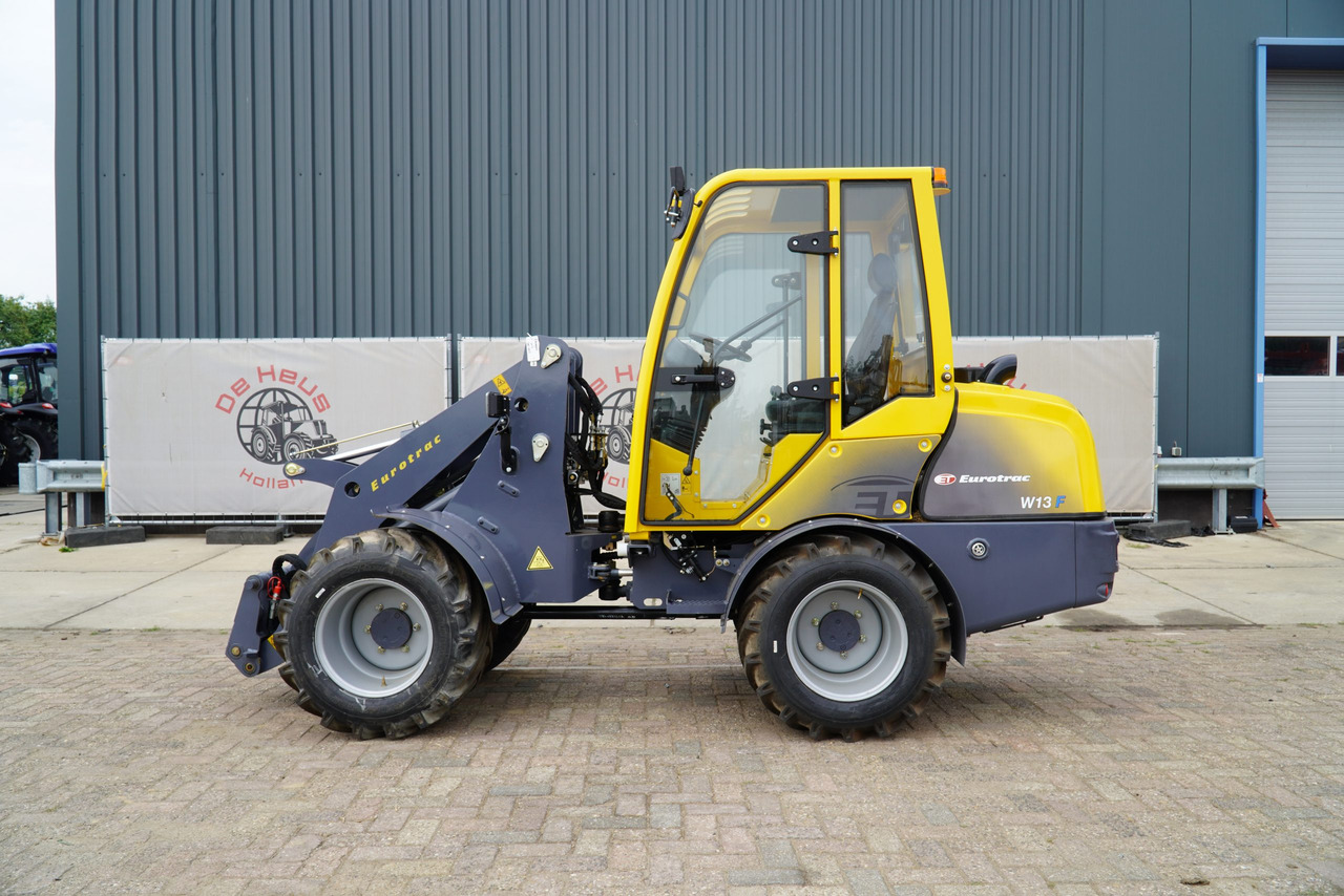 Eurotrac W13 Radlader Hoflader - Zglobni utovarivač: slika Eurotrac W13 Radlader Hoflader - Zglobni utovarivač Eurotrac W13 Radlader Hoflader - Zglobni utovarivač: slika Eurotrac W13 Radlader Hoflader - Zglobni utovarivač