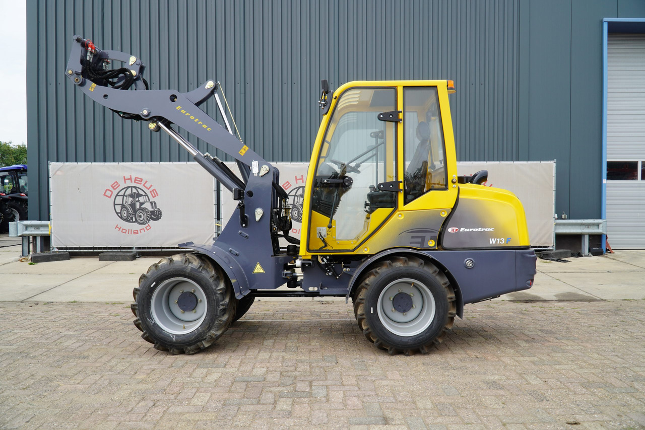 Eurotrac W13 Radlader Hoflader - Zglobni utovarivač: slika Eurotrac W13 Radlader Hoflader - Zglobni utovarivač Eurotrac W13 Radlader Hoflader - Zglobni utovarivač: slika Eurotrac W13 Radlader Hoflader - Zglobni utovarivač