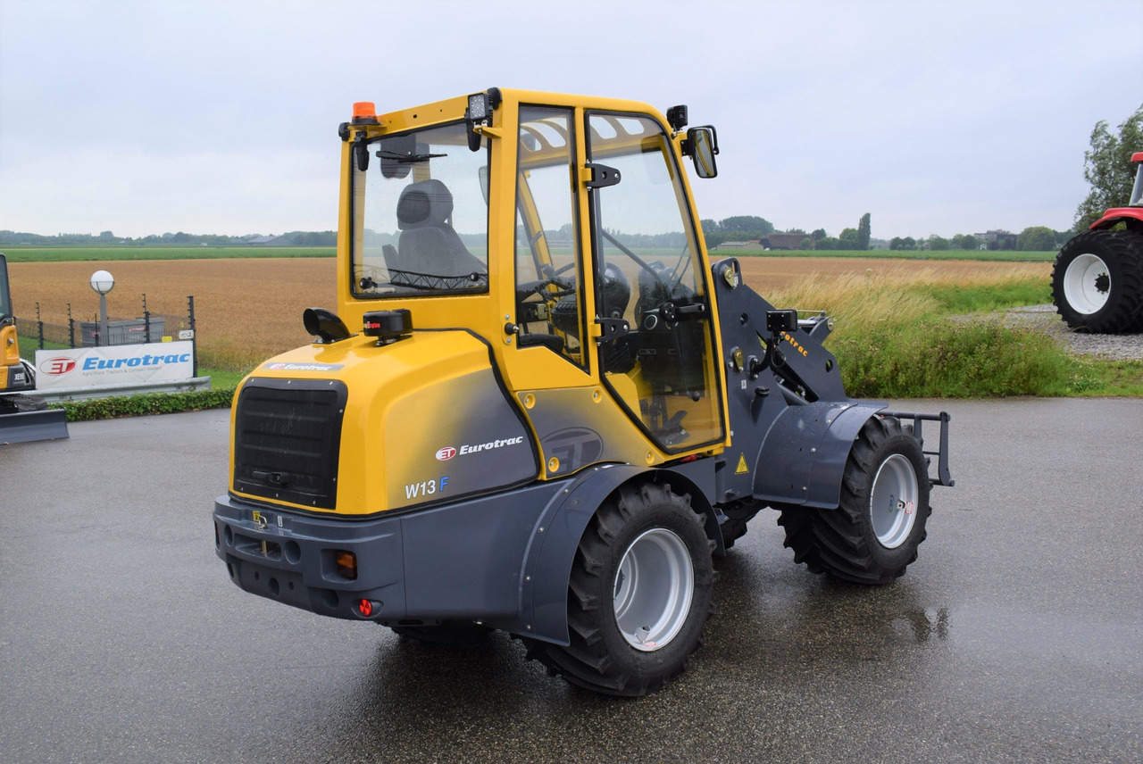 Eurotrac W13 Radlader Hoflader - Zglobni utovarivač: slika Eurotrac W13 Radlader Hoflader - Zglobni utovarivač Eurotrac W13 Radlader Hoflader - Zglobni utovarivač: slika Eurotrac W13 Radlader Hoflader - Zglobni utovarivač