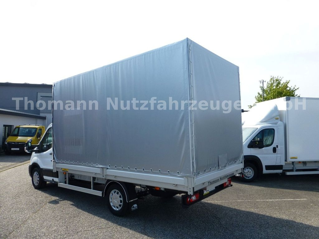 Ford Transit Pritsche Plane 4,25m Klima Temp. DAB - Dostavno vozilo s ceradom: slika Ford Transit Pritsche Plane 4,25m Klima Temp. DAB - Dostavno vozilo s ceradom Ford Transit Pritsche Plane 4,25m Klima Temp. DAB - Dostavno vozilo s ceradom: slika Ford Transit Pritsche Plane 4,25m Klima Temp. DAB - Dostavno vozilo s ceradom