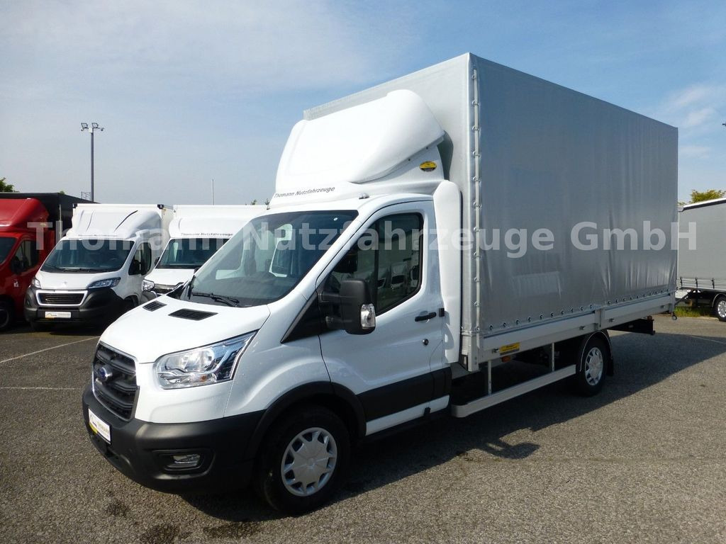 Ford Transit Pritsche Plane 4,25m Klima Temp. DAB - Dostavno vozilo s ceradom: slika Ford Transit Pritsche Plane 4,25m Klima Temp. DAB - Dostavno vozilo s ceradom Ford Transit Pritsche Plane 4,25m Klima Temp. DAB - Dostavno vozilo s ceradom: slika Ford Transit Pritsche Plane 4,25m Klima Temp. DAB - Dostavno vozilo s ceradom