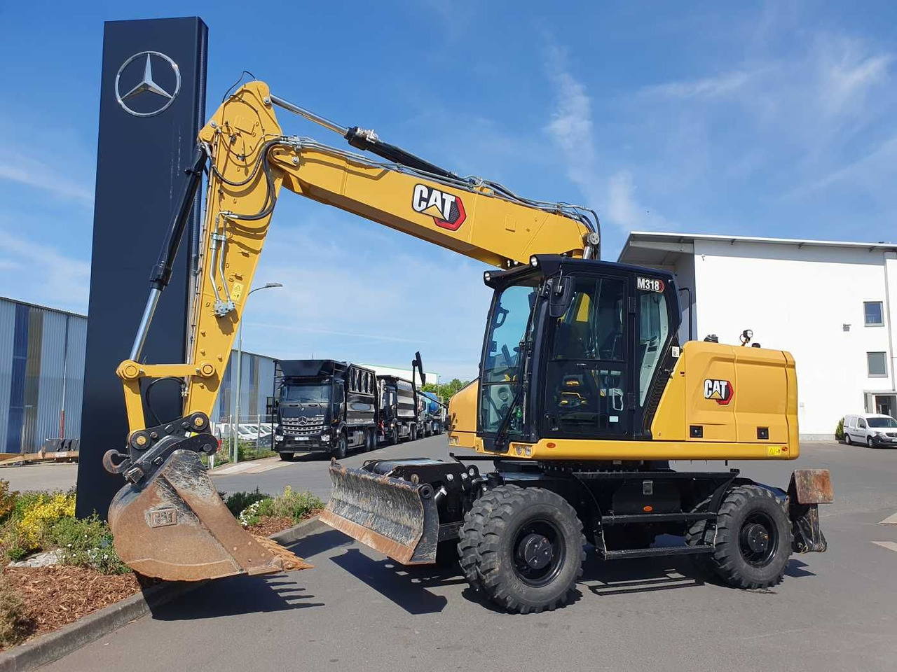 CAT M318 / 2022 / nur 286h! / Tieflöffel / Pratzen - Bager na kotačima: slika CAT M318 / 2022 / nur 286h! / Tieflöffel / Pratzen - Bager na kotačima CAT M318 / 2022 / nur 286h! / Tieflöffel / Pratzen - Bager na kotačima: slika CAT M318 / 2022 / nur 286h! / Tieflöffel / Pratzen - Bager na kotačima