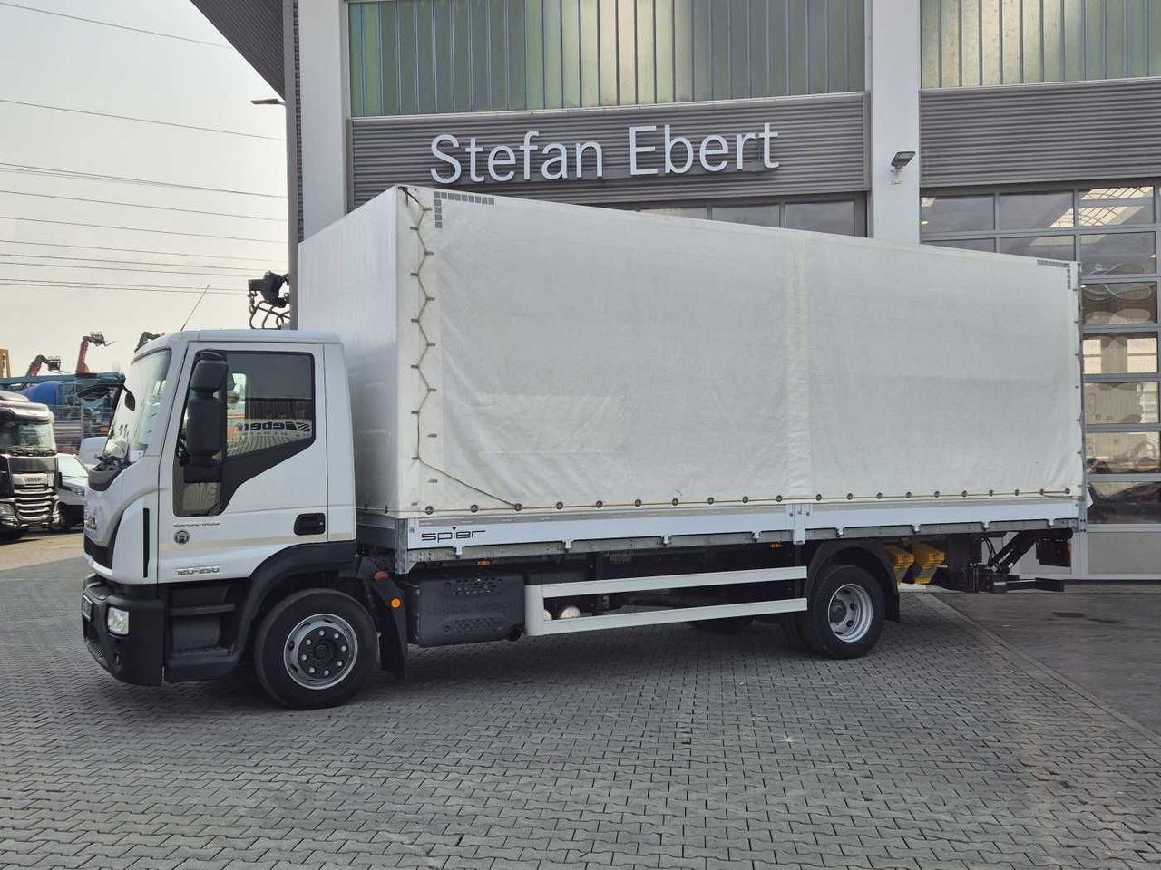 Iveco Eurocargo ML120E25 LBW 1.500kg Klima 3 Sitze - Kamion s ceradom: slika Iveco Eurocargo ML120E25 LBW 1.500kg Klima 3 Sitze - Kamion s ceradom Iveco Eurocargo ML120E25 LBW 1.500kg Klima 3 Sitze - Kamion s ceradom: slika Iveco Eurocargo ML120E25 LBW 1.500kg Klima 3 Sitze - Kamion s ceradom