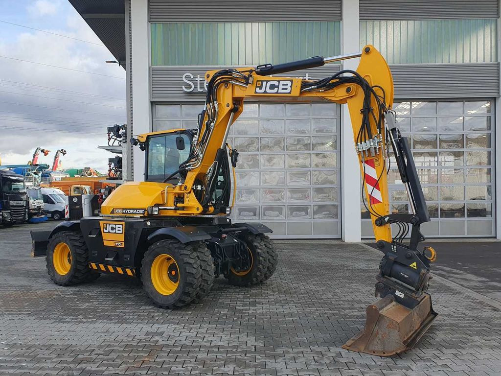 JCB Hydradig HD 110WT / 2022 / nur 239h! / Powertilt - Bager na kotačima: slika JCB Hydradig HD 110WT / 2022 / nur 239h! / Powertilt - Bager na kotačima JCB Hydradig HD 110WT / 2022 / nur 239h! / Powertilt - Bager na kotačima: slika JCB Hydradig HD 110WT / 2022 / nur 239h! / Powertilt - Bager na kotačima
