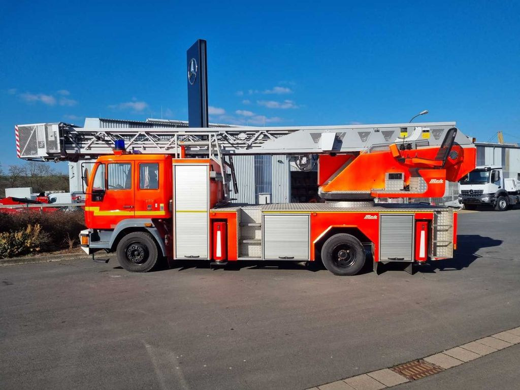 MAN 15.284LC Metz DLK 23-12 Feuerwehr Drehleiter - Kamion: slika MAN 15.284LC Metz DLK 23-12 Feuerwehr Drehleiter - Kamion MAN 15.284LC Metz DLK 23-12 Feuerwehr Drehleiter - Kamion: slika MAN 15.284LC Metz DLK 23-12 Feuerwehr Drehleiter - Kamion