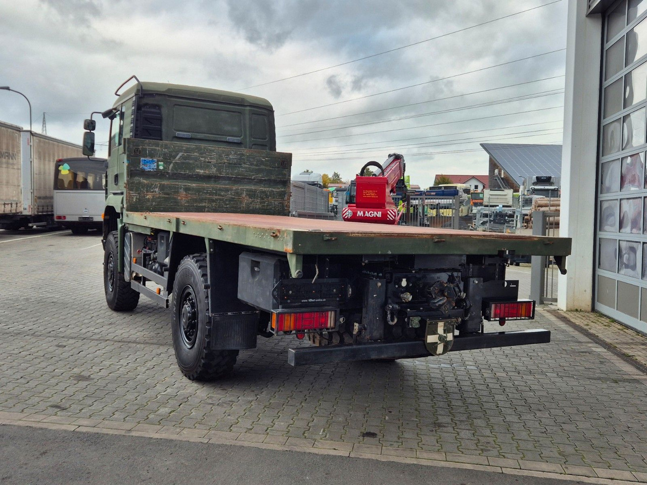 Kamion s otvorenim sandukom MAN TGA 18.360 4x4 BB Pritsche Single Bereifung: slika Kamion s otvorenim sandukom MAN TGA 18.360 4x4 BB Pritsche Single Bereifung Kamion s otvorenim sandukom MAN TGA 18.360 4x4 BB Pritsche Single Bereifung: slika Kamion s otvorenim sandukom MAN TGA 18.360 4x4 BB Pritsche Single Bereifung