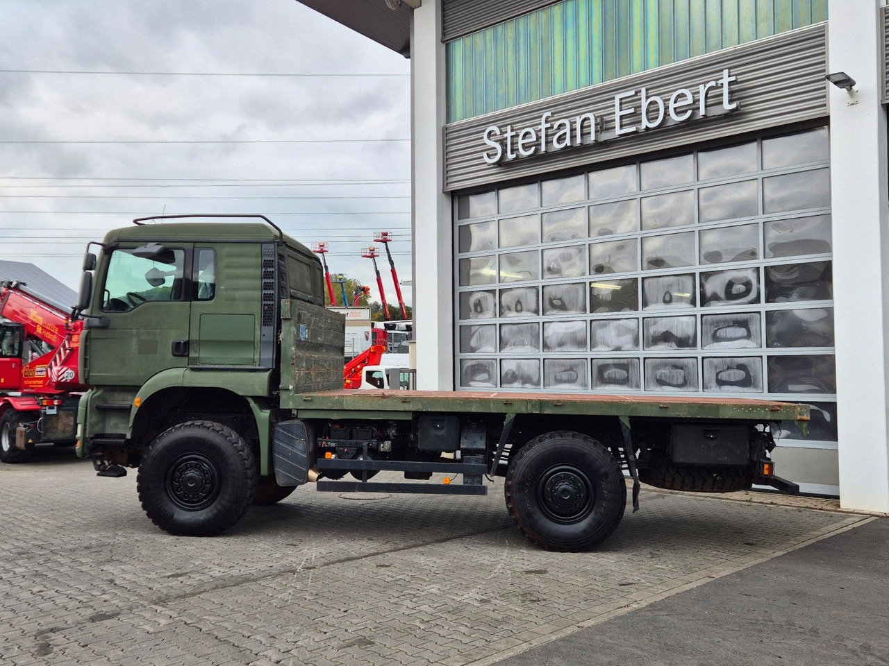 Kamion s otvorenim sandukom MAN TGA 18.360 4x4 BB Pritsche Single Bereifung: slika Kamion s otvorenim sandukom MAN TGA 18.360 4x4 BB Pritsche Single Bereifung Kamion s otvorenim sandukom MAN TGA 18.360 4x4 BB Pritsche Single Bereifung: slika Kamion s otvorenim sandukom MAN TGA 18.360 4x4 BB Pritsche Single Bereifung