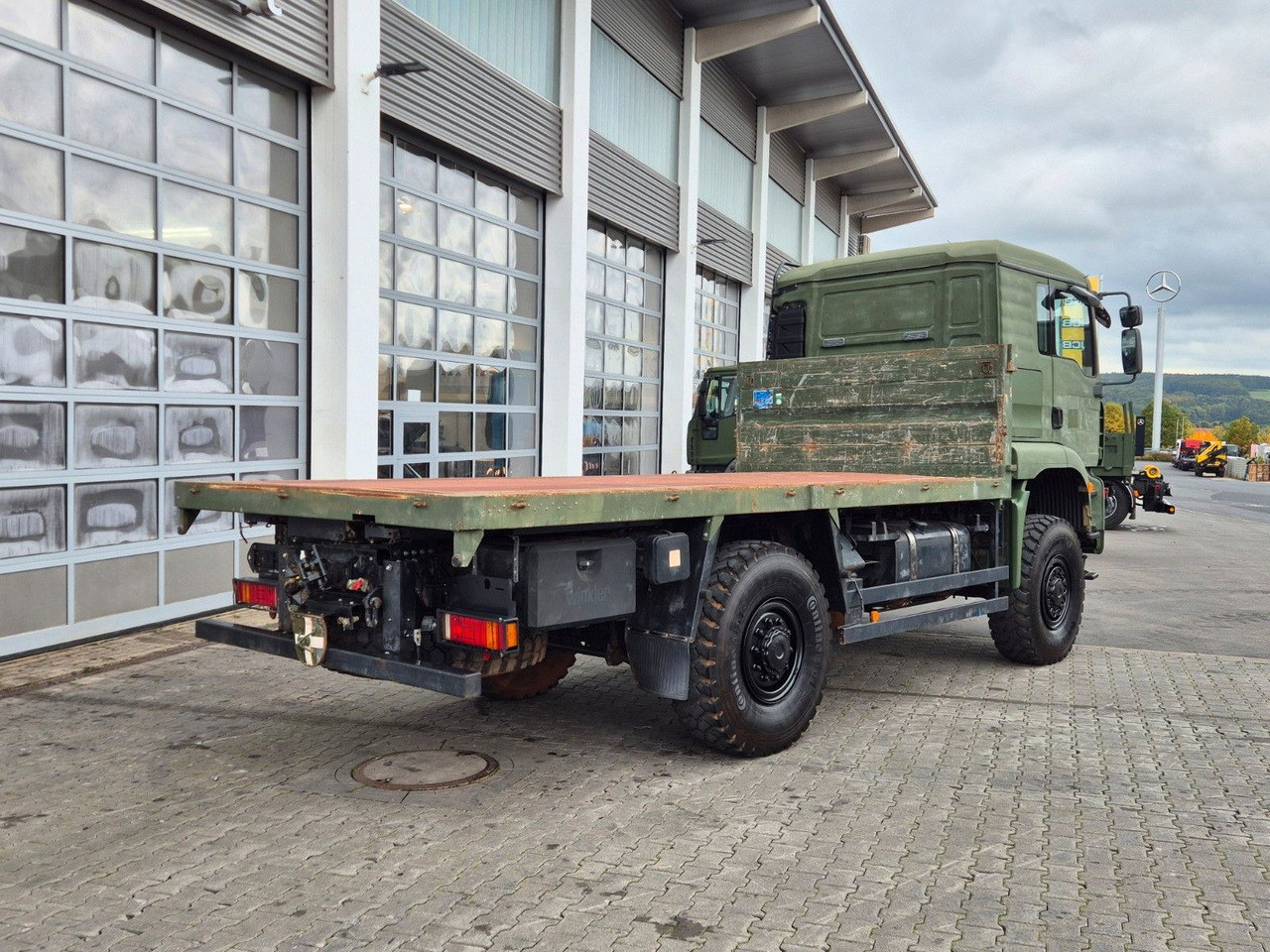 Kamion s otvorenim sandukom MAN TGA 18.360 4x4 BB Pritsche Single Bereifung: slika Kamion s otvorenim sandukom MAN TGA 18.360 4x4 BB Pritsche Single Bereifung Kamion s otvorenim sandukom MAN TGA 18.360 4x4 BB Pritsche Single Bereifung: slika Kamion s otvorenim sandukom MAN TGA 18.360 4x4 BB Pritsche Single Bereifung