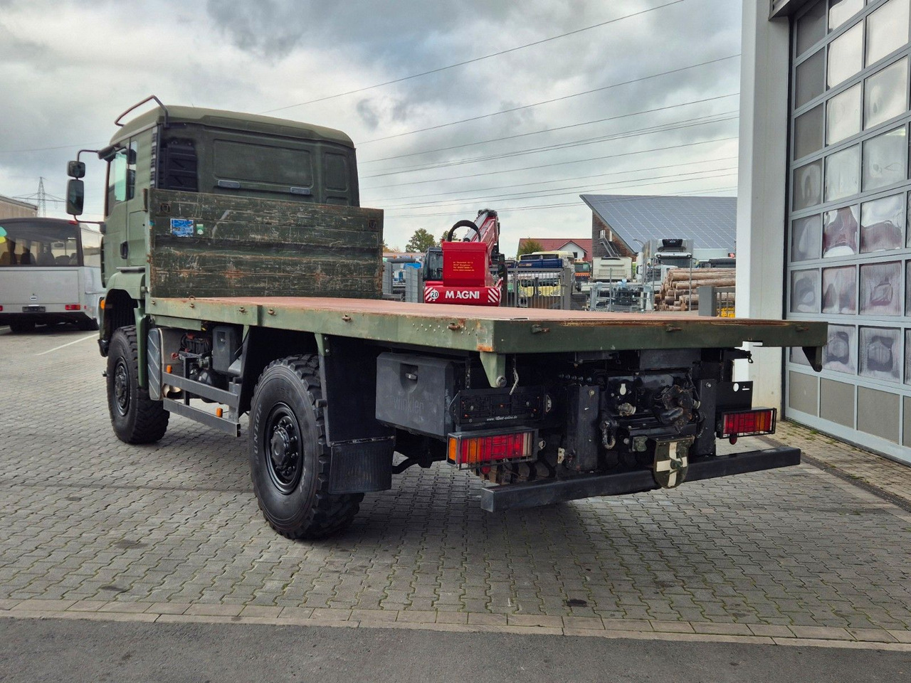 Kamion s otvorenim sandukom MAN TGA 18.360 4x4 BB Pritsche Single Bereifung: slika Kamion s otvorenim sandukom MAN TGA 18.360 4x4 BB Pritsche Single Bereifung Kamion s otvorenim sandukom MAN TGA 18.360 4x4 BB Pritsche Single Bereifung: slika Kamion s otvorenim sandukom MAN TGA 18.360 4x4 BB Pritsche Single Bereifung