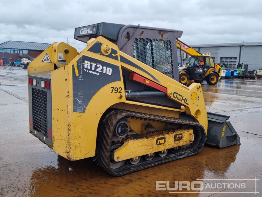 2012 Gehl RT210 - Mini utovarivač: slika 2012 Gehl RT210 - Mini utovarivač 2012 Gehl RT210 - Mini utovarivač: slika 2012 Gehl RT210 - Mini utovarivač