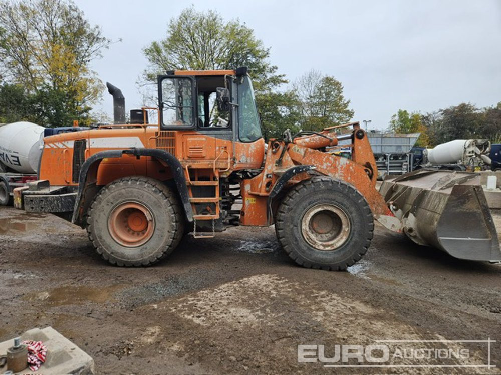 Doosan DL300 - Utovarivač na kotačima: slika Doosan DL300 - Utovarivač na kotačima Doosan DL300 - Utovarivač na kotačima: slika Doosan DL300 - Utovarivač na kotačima