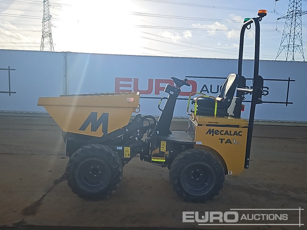 Mecalac TA1EH - Mini istovarivač: slika Mecalac TA1EH - Mini istovarivač Mecalac TA1EH - Mini istovarivač: slika Mecalac TA1EH - Mini istovarivač