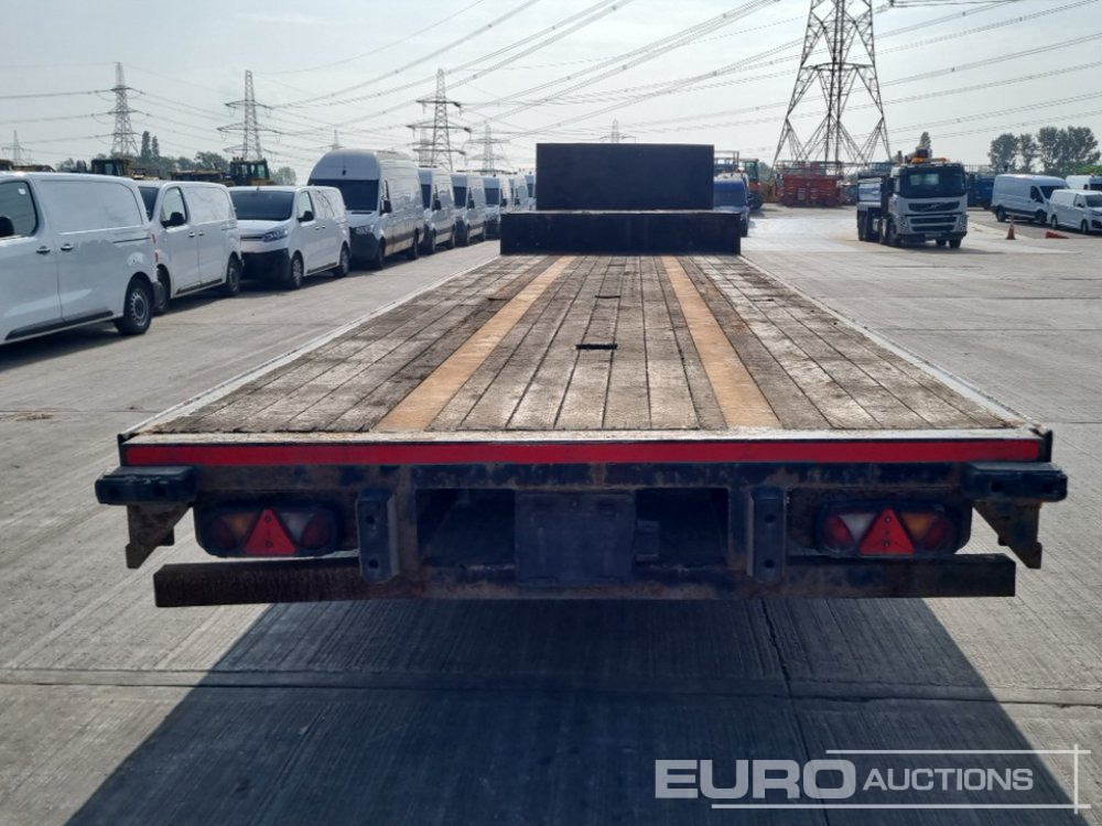 Montracon Tri Axle Step Frame Trailer - Poluprikolica s niskim utovarivačem: slika Montracon Tri Axle Step Frame Trailer - Poluprikolica s niskim utovarivačem Montracon Tri Axle Step Frame Trailer - Poluprikolica s niskim utovarivačem: slika Montracon Tri Axle Step Frame Trailer - Poluprikolica s niskim utovarivačem