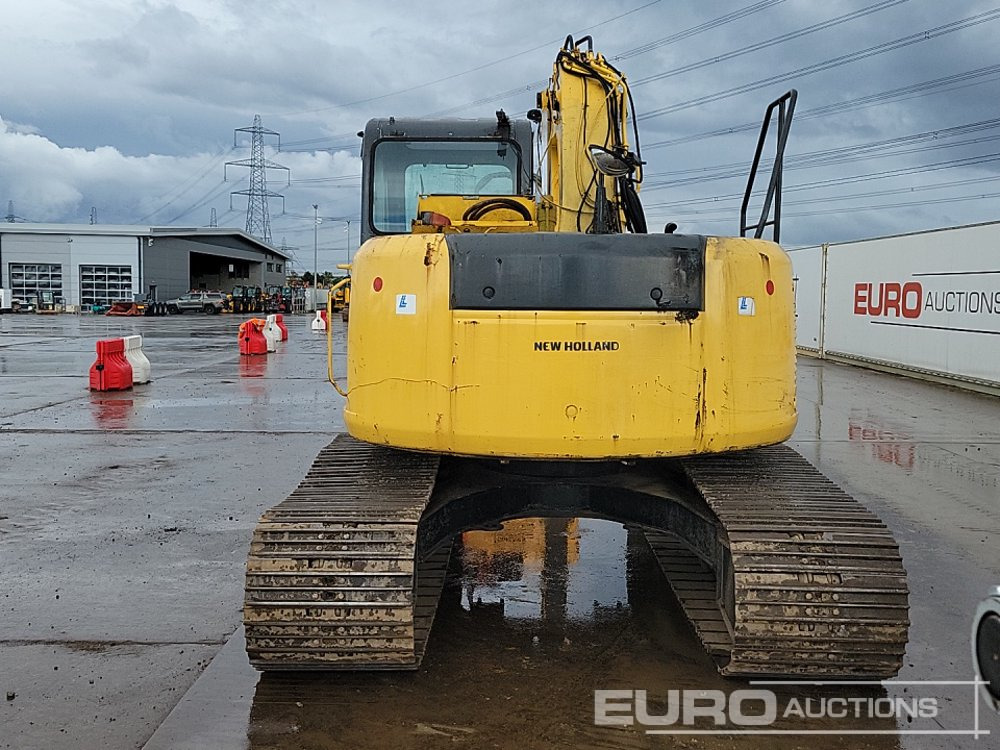 New Holland E135SR-1ES - Bager gusjeničar: slika New Holland E135SR-1ES - Bager gusjeničar New Holland E135SR-1ES - Bager gusjeničar: slika New Holland E135SR-1ES - Bager gusjeničar