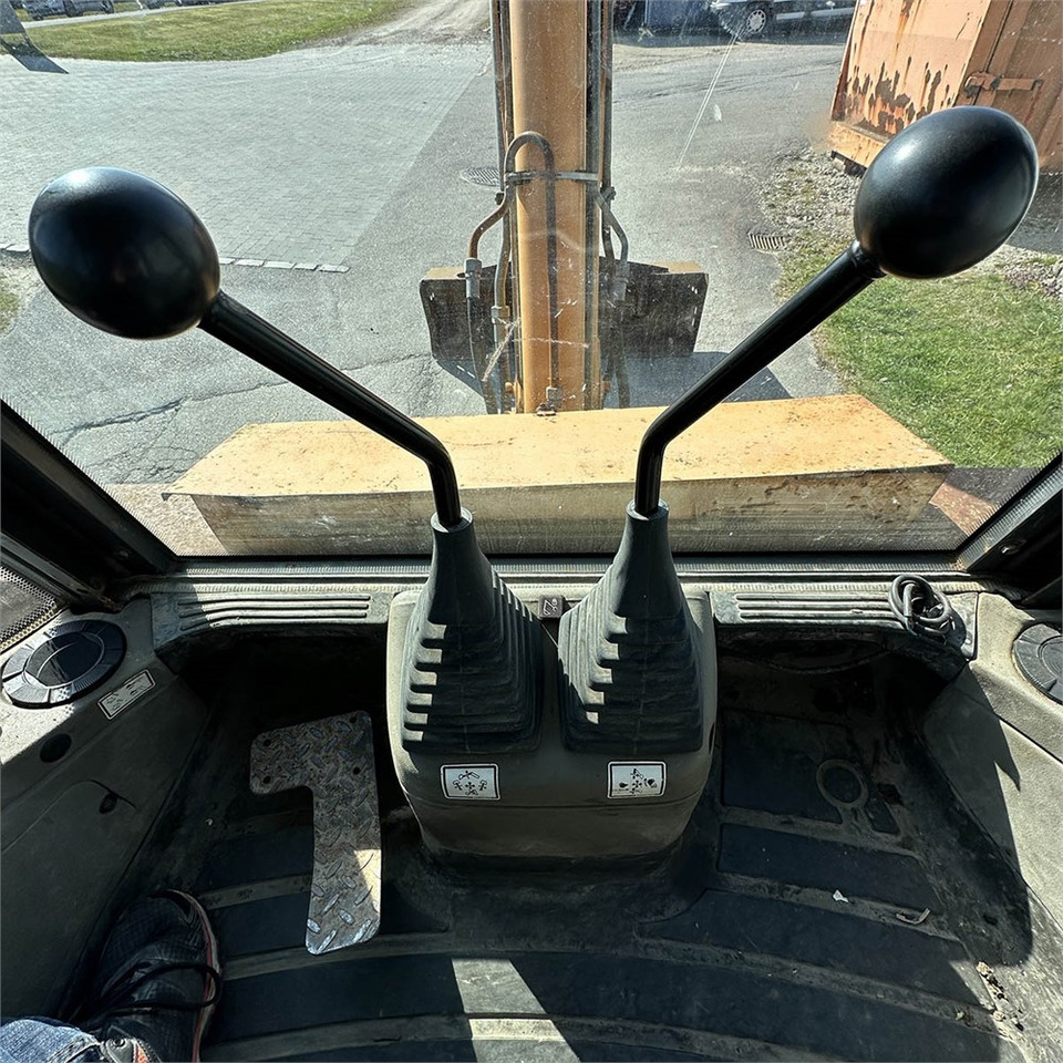 Rovokopač-utovarivač Case 695SM-4PS: slika Rovokopač-utovarivač Case 695SM-4PS Rovokopač-utovarivač Case 695SM-4PS: slika Rovokopač-utovarivač Case 695SM-4PS