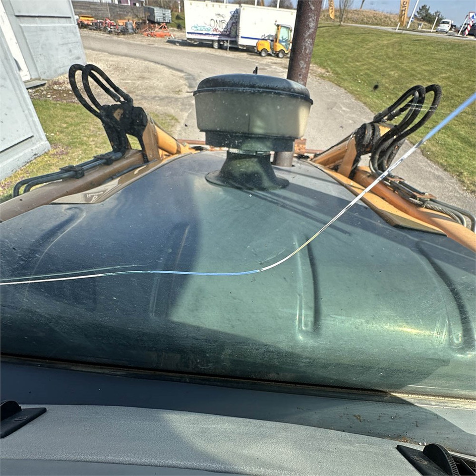 Rovokopač-utovarivač Case 695SM-4PS: slika Rovokopač-utovarivač Case 695SM-4PS Rovokopač-utovarivač Case 695SM-4PS: slika Rovokopač-utovarivač Case 695SM-4PS