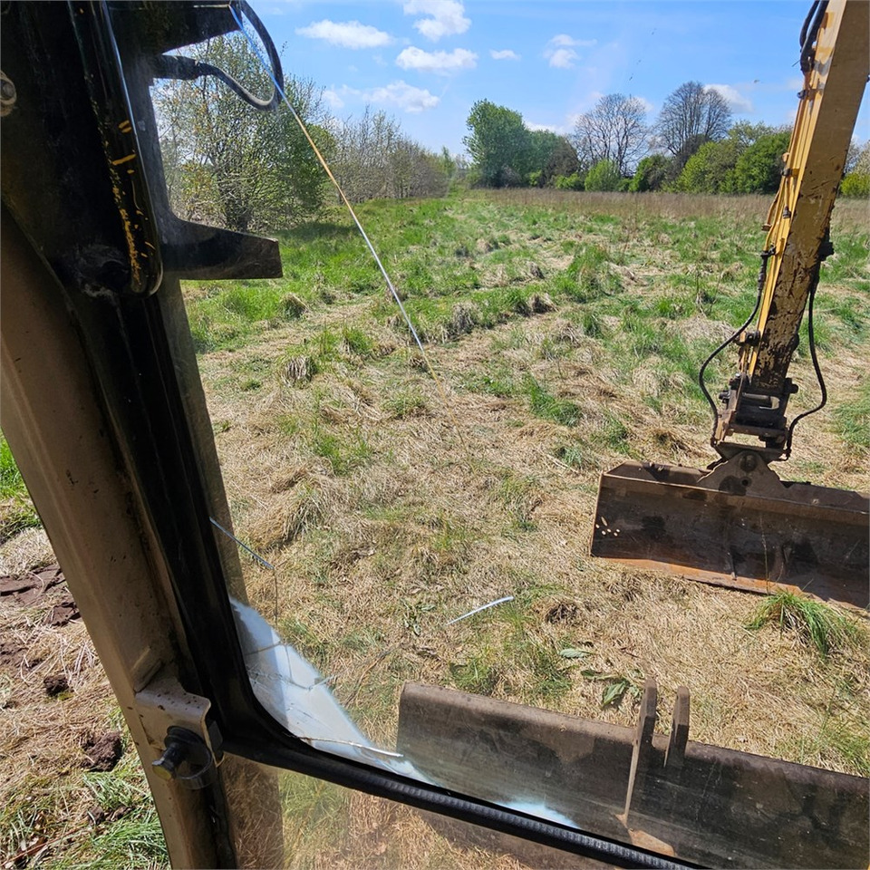 Zakup Caterpillar 307 B Caterpillar 307 B: slika Zakup Caterpillar 307 B Caterpillar 307 B