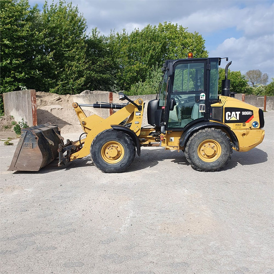 Caterpillar 906 H2 - Utovarivač na kotačima: slika Caterpillar 906 H2 - Utovarivač na kotačima Caterpillar 906 H2 - Utovarivač na kotačima: slika Caterpillar 906 H2 - Utovarivač na kotačima