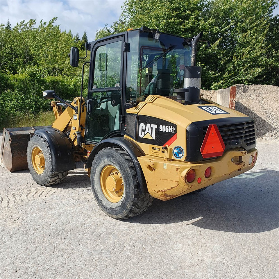 Caterpillar 906 H2 - Utovarivač na kotačima: slika Caterpillar 906 H2 - Utovarivač na kotačima Caterpillar 906 H2 - Utovarivač na kotačima: slika Caterpillar 906 H2 - Utovarivač na kotačima