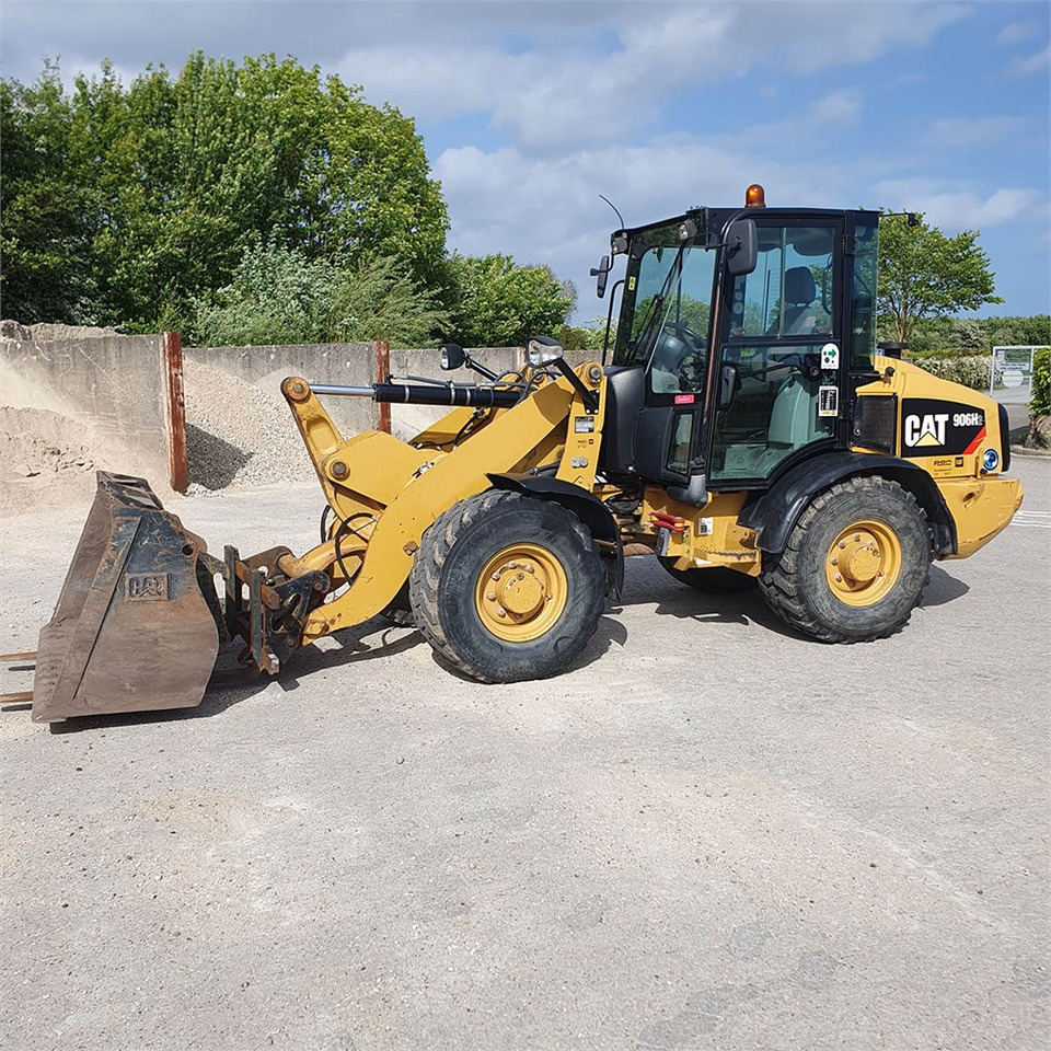 Caterpillar 906 H2 - Utovarivač na kotačima: slika Caterpillar 906 H2 - Utovarivač na kotačima Caterpillar 906 H2 - Utovarivač na kotačima: slika Caterpillar 906 H2 - Utovarivač na kotačima