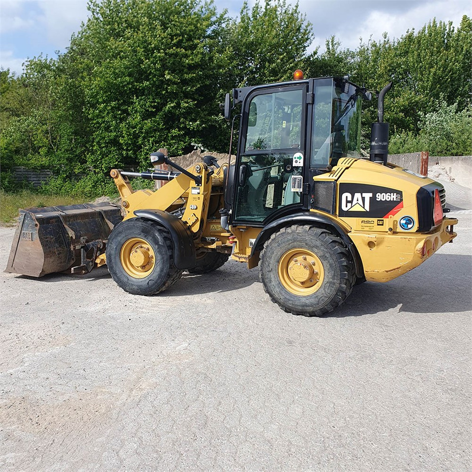 Caterpillar 906 H2 - Utovarivač na kotačima: slika Caterpillar 906 H2 - Utovarivač na kotačima Caterpillar 906 H2 - Utovarivač na kotačima: slika Caterpillar 906 H2 - Utovarivač na kotačima
