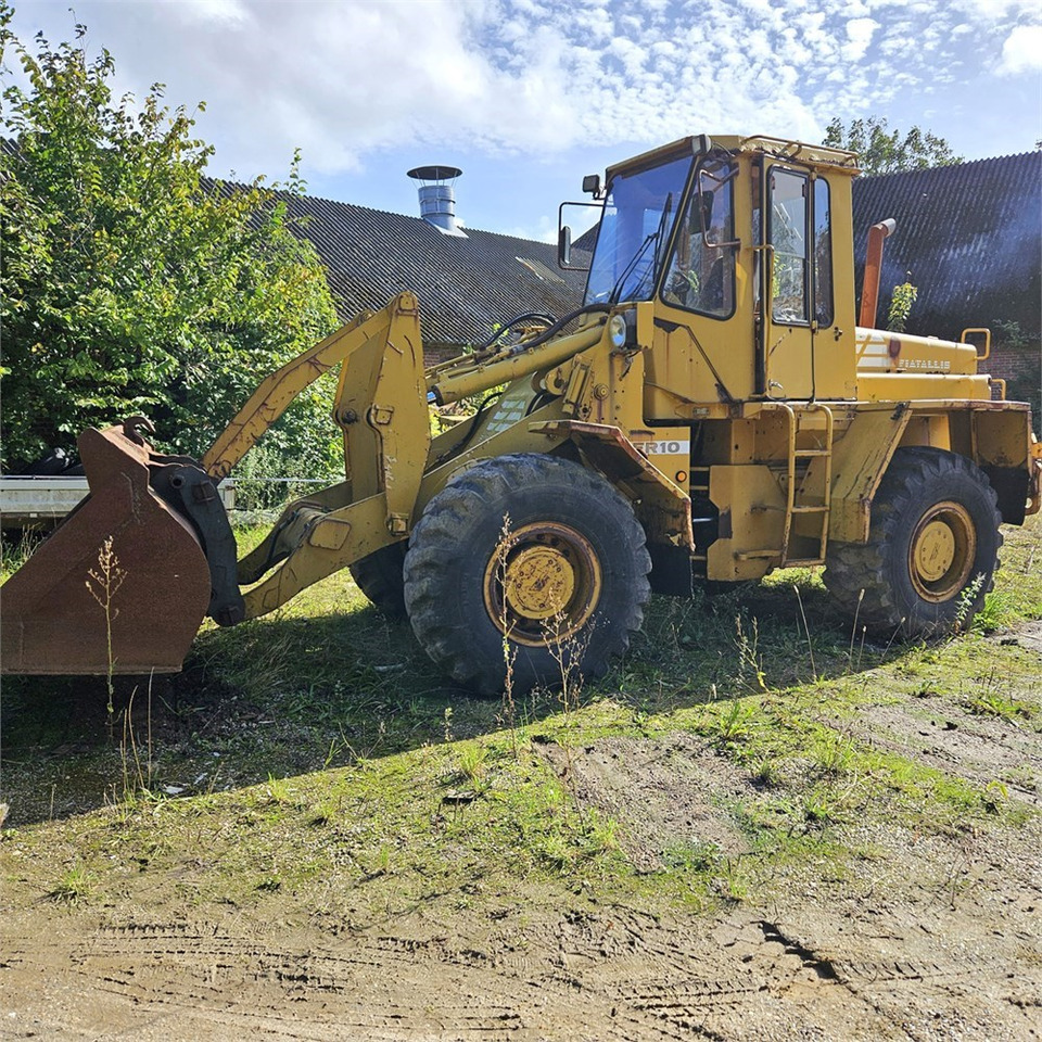 Fiat-Allis FR10 - Utovarivač na kotačima: slika Fiat-Allis FR10 - Utovarivač na kotačima Fiat-Allis FR10 - Utovarivač na kotačima: slika Fiat-Allis FR10 - Utovarivač na kotačima