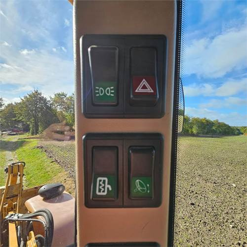 Rovokopač-utovarivač Hydrema 906 D: slika Rovokopač-utovarivač Hydrema 906 D Rovokopač-utovarivač Hydrema 906 D: slika Rovokopač-utovarivač Hydrema 906 D