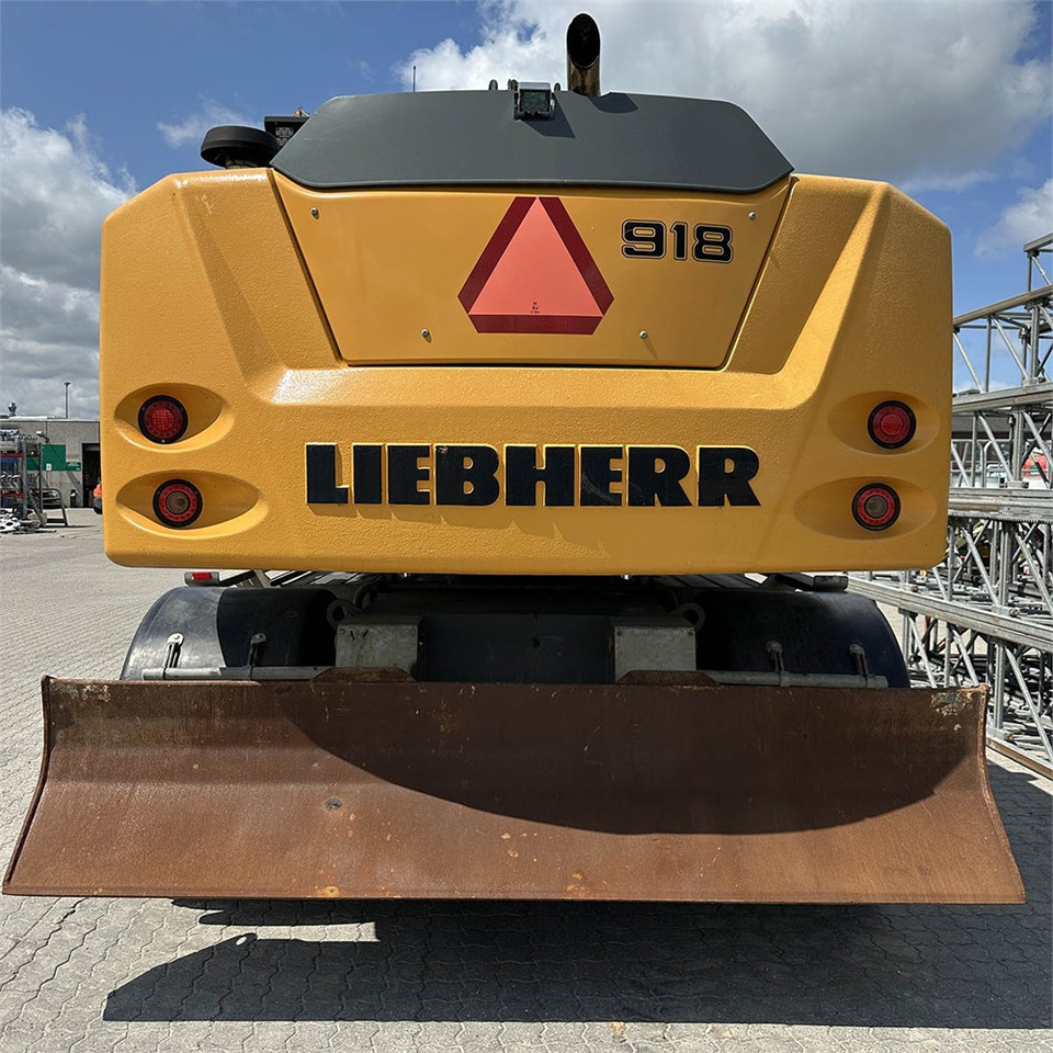 Liebherr A 918 Litronic - Bager na kotačima: slika Liebherr A 918 Litronic - Bager na kotačima Liebherr A 918 Litronic - Bager na kotačima: slika Liebherr A 918 Litronic - Bager na kotačima