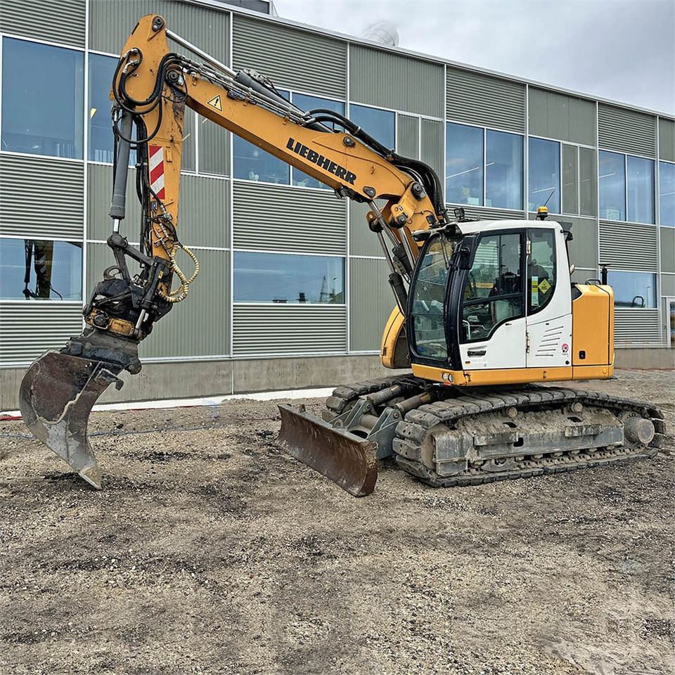 Liebherr R914 Compact Litronic - Mini bager: slika Liebherr R914 Compact Litronic - Mini bager Liebherr R914 Compact Litronic - Mini bager: slika Liebherr R914 Compact Litronic - Mini bager