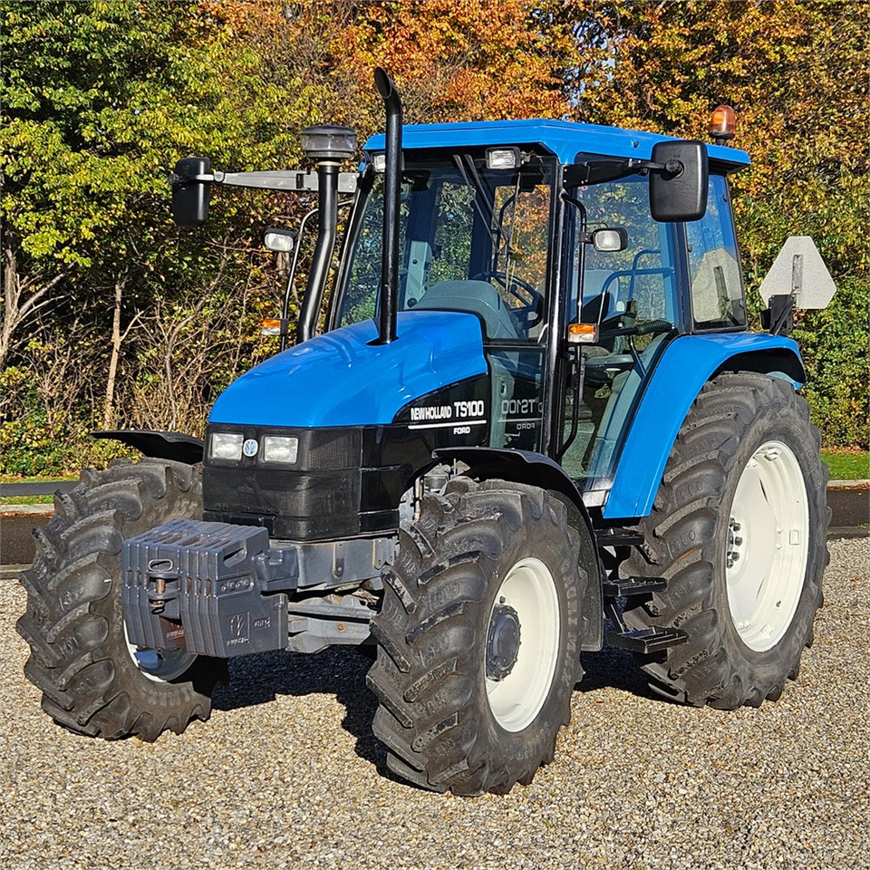 New Holland TS 100 - Traktor: slika New Holland TS 100 - Traktor New Holland TS 100 - Traktor: slika New Holland TS 100 - Traktor