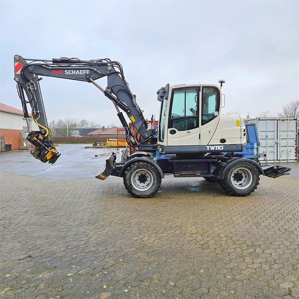 Schaeff-Terex TW110 - Bager na kotačima: slika Schaeff-Terex TW110 - Bager na kotačima Schaeff-Terex TW110 - Bager na kotačima: slika Schaeff-Terex TW110 - Bager na kotačima