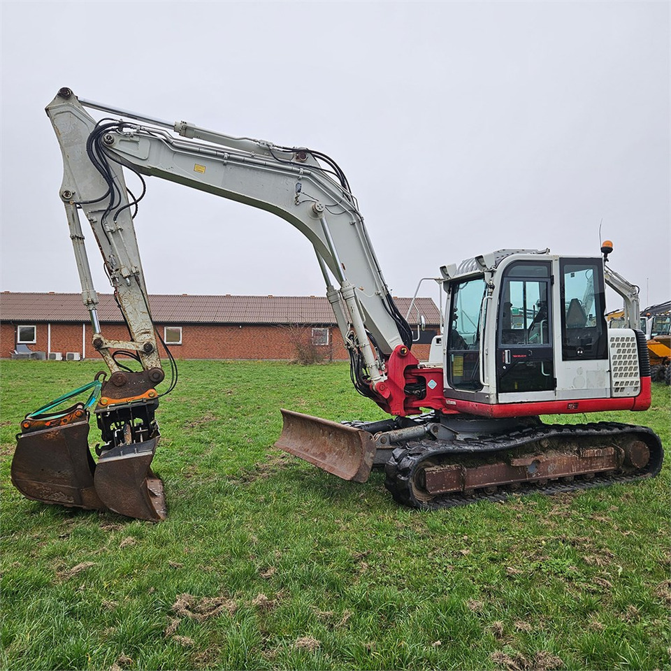 Takeuchi TB1140 - Bager gusjeničar: slika Takeuchi TB1140 - Bager gusjeničar Takeuchi TB1140 - Bager gusjeničar: slika Takeuchi TB1140 - Bager gusjeničar