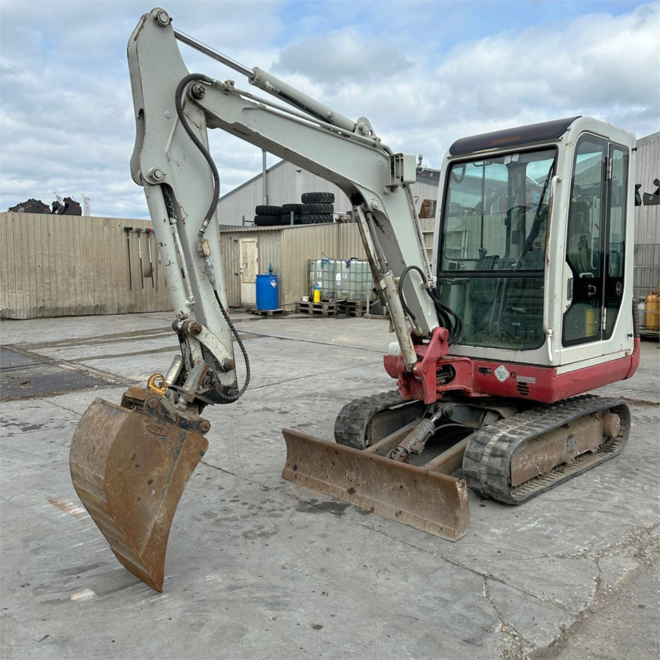 Takeuchi TB125 - Mini bager: slika Takeuchi TB125 - Mini bager Takeuchi TB125 - Mini bager: slika Takeuchi TB125 - Mini bager