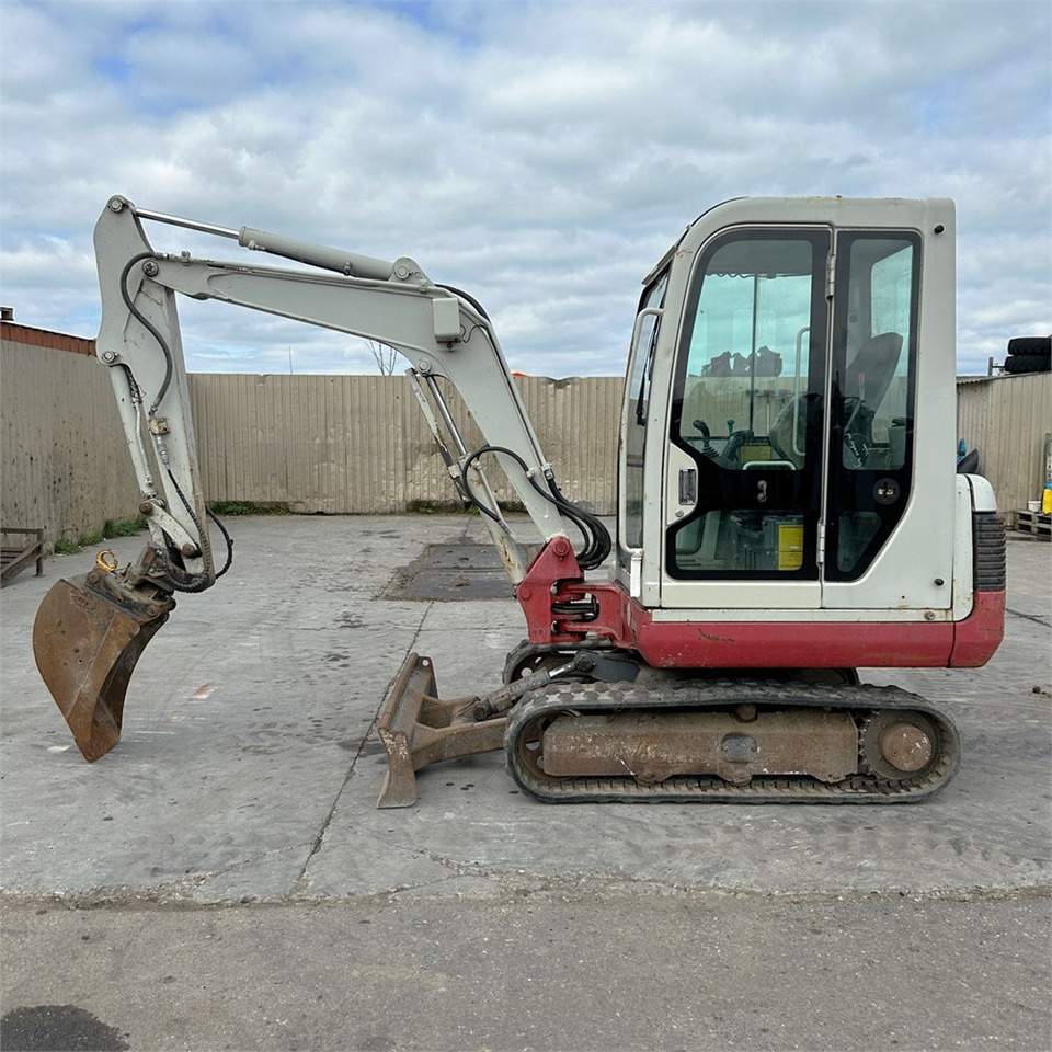 Takeuchi TB125 - Mini bager: slika Takeuchi TB125 - Mini bager Takeuchi TB125 - Mini bager: slika Takeuchi TB125 - Mini bager
