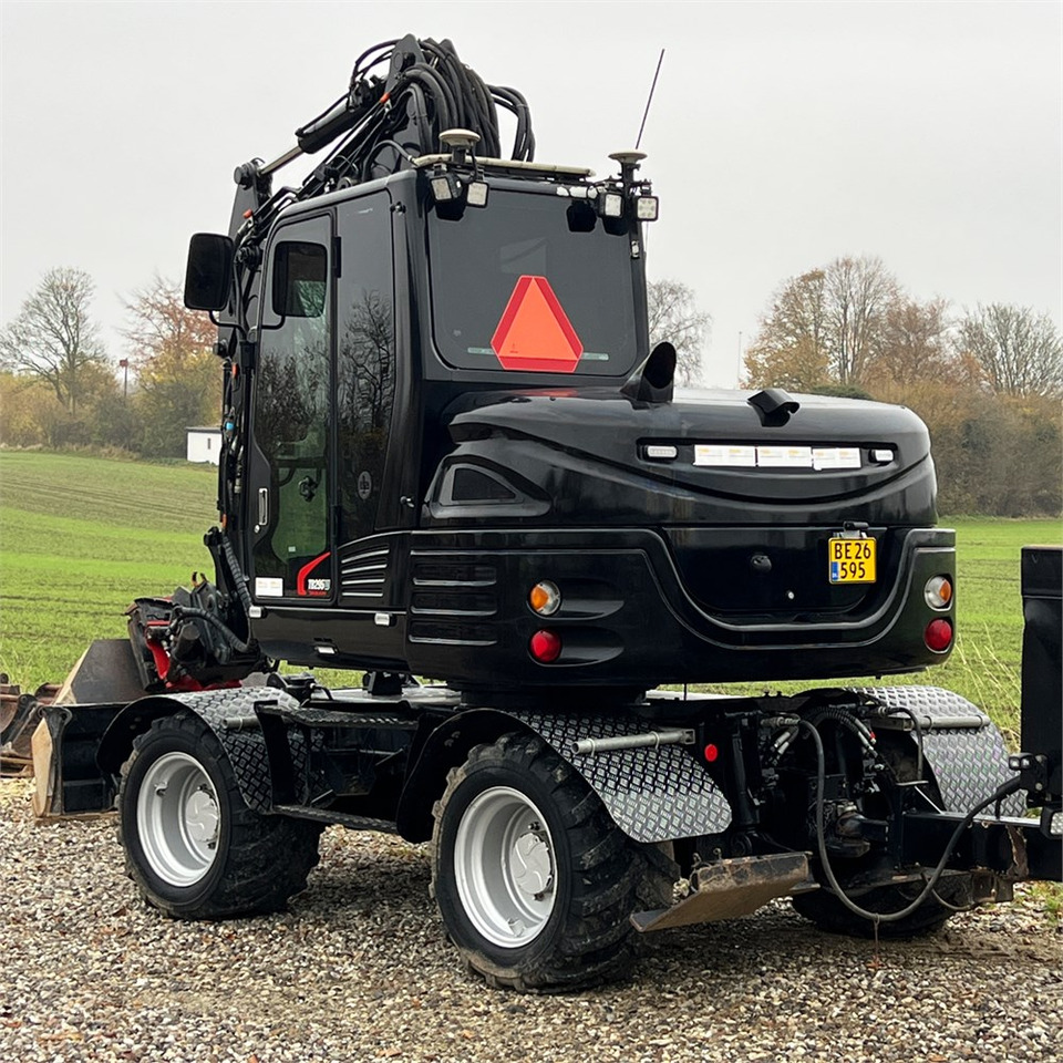 Takeuchi TB295 W - Bager na kotačima: slika Takeuchi TB295 W - Bager na kotačima Takeuchi TB295 W - Bager na kotačima: slika Takeuchi TB295 W - Bager na kotačima