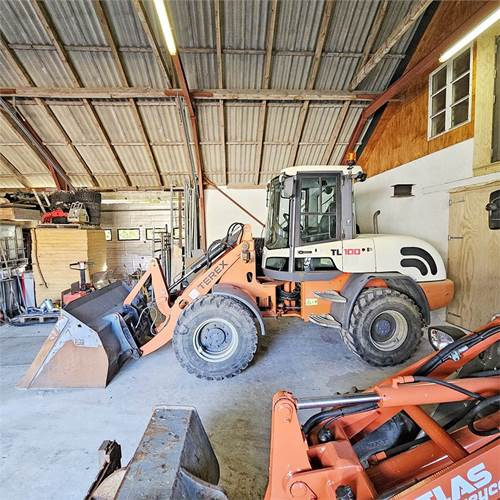 Terex TL100 - Utovarivač na kotačima: slika Terex TL100 - Utovarivač na kotačima Terex TL100 - Utovarivač na kotačima: slika Terex TL100 - Utovarivač na kotačima