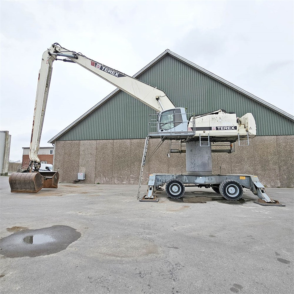 Terex TM520 - Bager na kotačima: slika Terex TM520 - Bager na kotačima Terex TM520 - Bager na kotačima: slika Terex TM520 - Bager na kotačima
