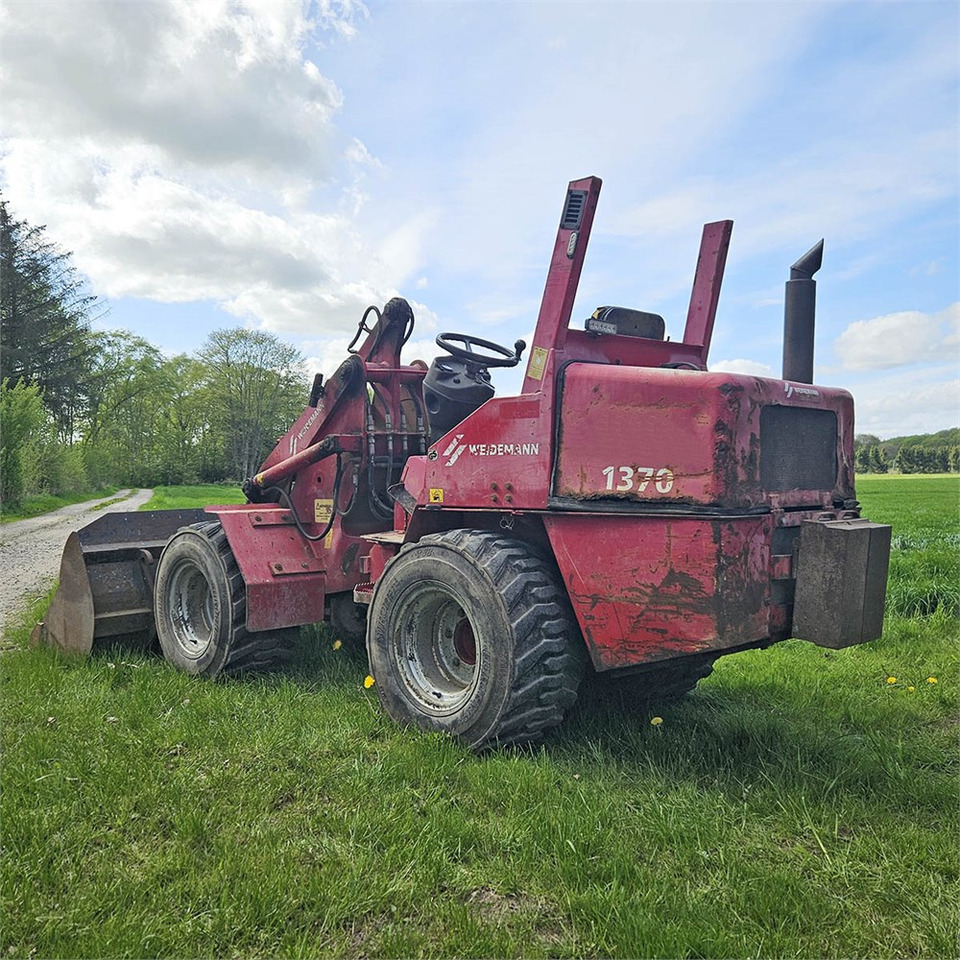 Weidemann 1370 - Utovarivač na kotačima: slika Weidemann 1370 - Utovarivač na kotačima Weidemann 1370 - Utovarivač na kotačima: slika Weidemann 1370 - Utovarivač na kotačima