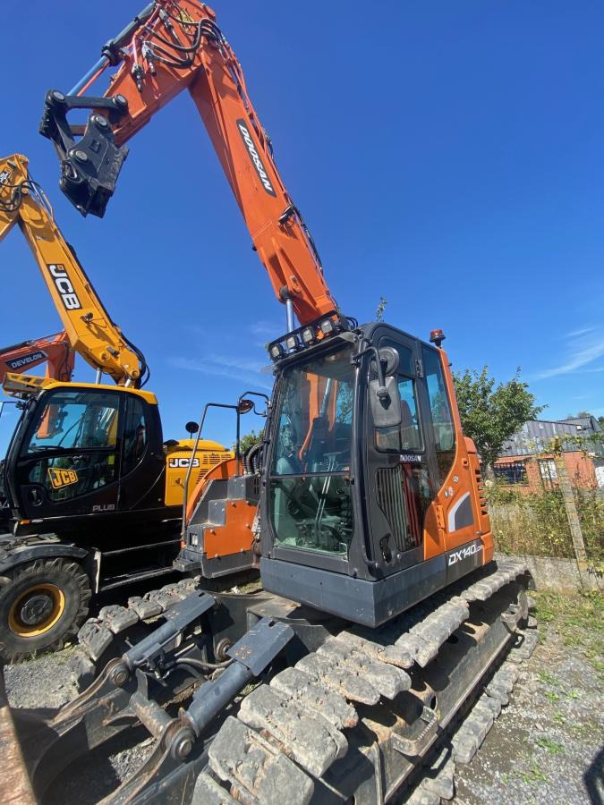 Doosan DX 140LCR-5 - Bager gusjeničar: slika Doosan DX 140LCR-5 - Bager gusjeničar Doosan DX 140LCR-5 - Bager gusjeničar: slika Doosan DX 140LCR-5 - Bager gusjeničar