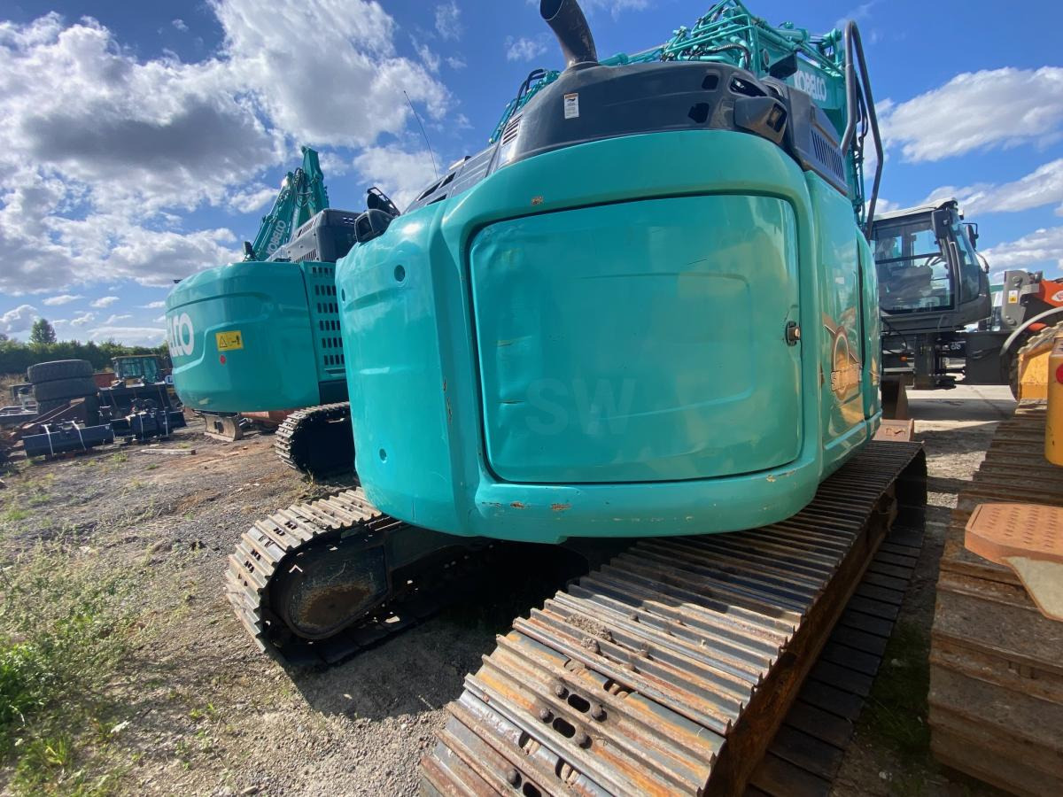 Kobelco SK 140SRLC-5 - Bager gusjeničar: slika Kobelco SK 140SRLC-5 - Bager gusjeničar Kobelco SK 140SRLC-5 - Bager gusjeničar: slika Kobelco SK 140SRLC-5 - Bager gusjeničar
