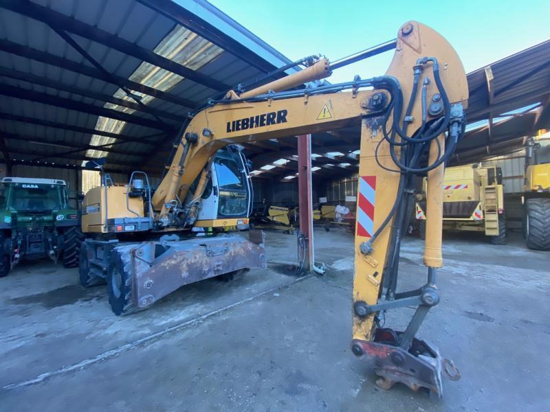 Liebherr A314 Litronic - Bager na kotačima: slika Liebherr A314 Litronic - Bager na kotačima Liebherr A314 Litronic - Bager na kotačima: slika Liebherr A314 Litronic - Bager na kotačima