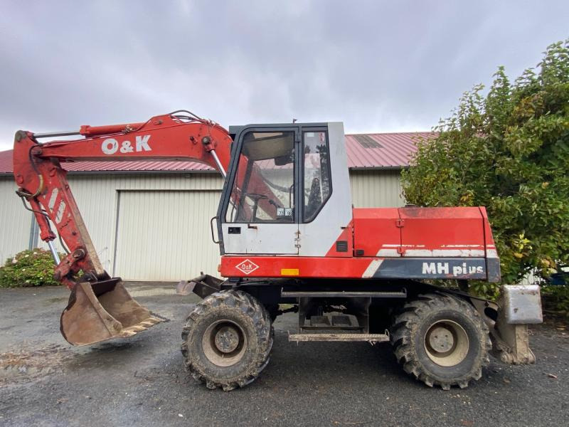 O&K MH 4PLUS - Bager na kotačima: slika O&K MH 4PLUS - Bager na kotačima O&K MH 4PLUS - Bager na kotačima: slika O&K MH 4PLUS - Bager na kotačima