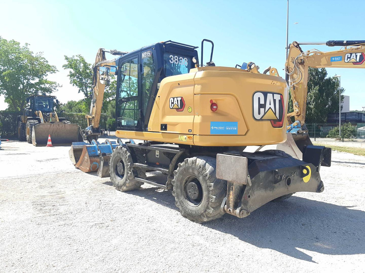 CAT M315 - Bager na kotačima: slika CAT M315 - Bager na kotačima CAT M315 - Bager na kotačima: slika CAT M315 - Bager na kotačima