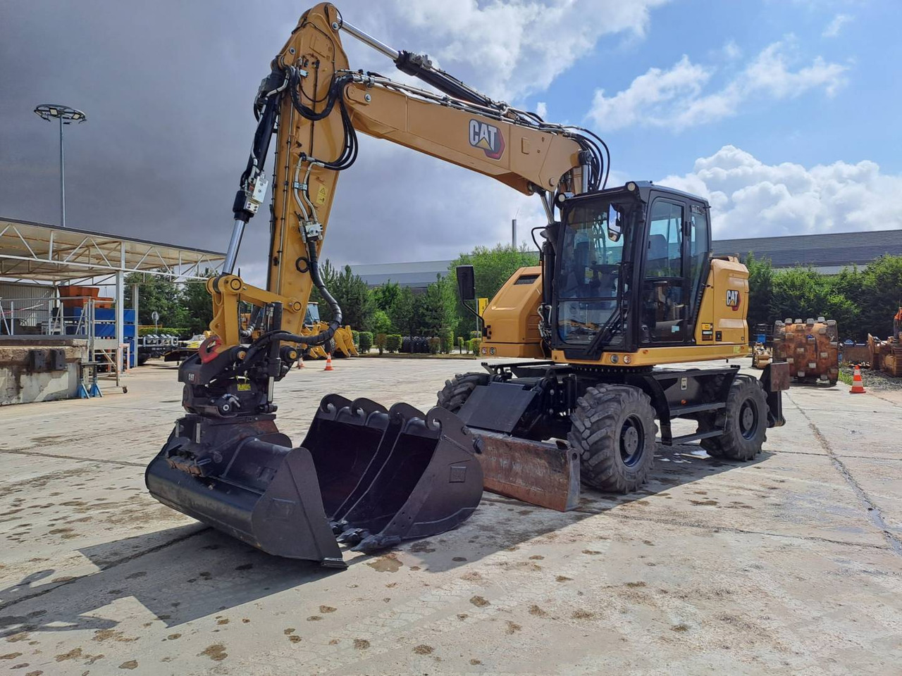 CAT M315 - Bager na kotačima: slika CAT M315 - Bager na kotačima CAT M315 - Bager na kotačima: slika CAT M315 - Bager na kotačima